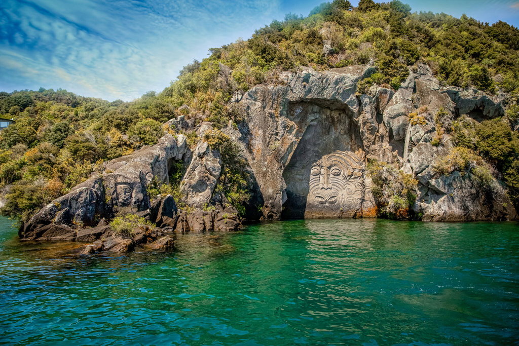 A Day Spent in Taupo, New Zealand - Mine Bay rock carving - Globetrotting horse riding holidays. Image by Elena Yakusheva via Shutterstock.