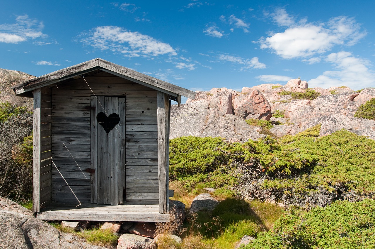 rustic toilet hut on mountain