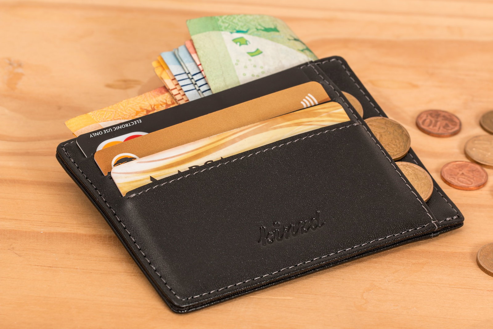 wallet with cash and cards
