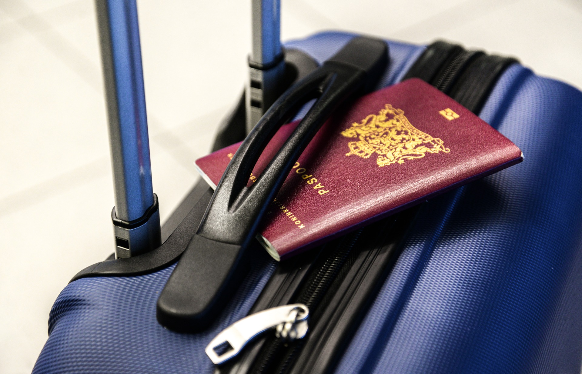 packed suitcase and passport